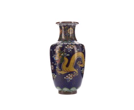 LATE 19TH CENTURY CHINESE CLOISONNE VASE,of baluster form, with dragons amongst clouds chasing the Sacred Pearl, dark blue gr