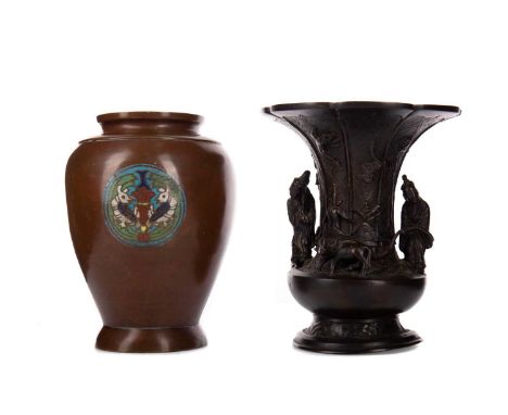 PAIR OF CHINESE BRONZE VASES,of small size with exaggerated rims, bearing twin rooster mask handles, the panels to body decor