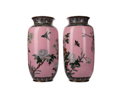 LARGE PAIR OF JAPANESE CLOISONNE VASES,early 20th century, decorated with floral sprays on a fuschia ground, 30.5cm highCondi