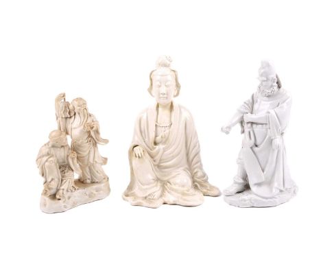 A Chinese Blanc de Chine porcelain figure of Guan Yu, Republic period or later, together with two other Blanc de Chine figure