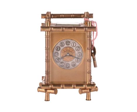 A late 19th-century French gilt brass 'bamboo' carriage clock, in the Aesthetic taste, the silvered dial bearing Arabic numer