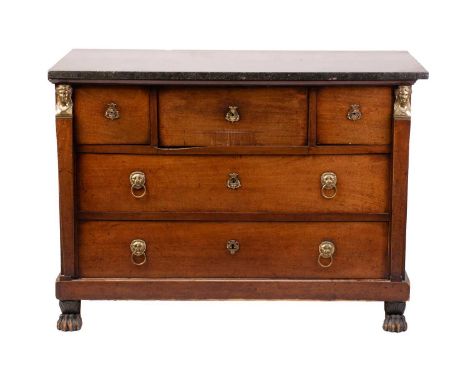 A French Empire mahogany secretaire commode, the black marble top over a central secretaire pull-out fall with leather surfac