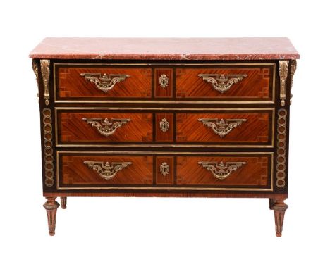 A Louis XVI style kingwood commode, 20th century, the red marble top on gilt-metal acanthus form brackets, over three crossba