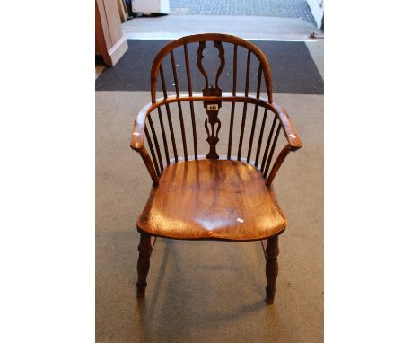 19thC Elm stick back Elbow chair with shaped seat and turned supports 