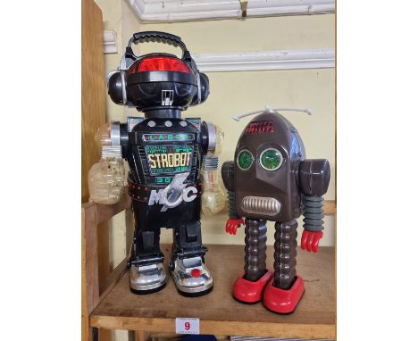 Robots: a vintage battery operated Thunder robot; together with a 1980s 'Strobot' (lacking gun). 