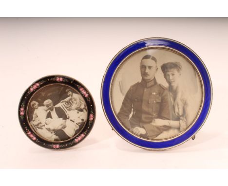 Continental silver photograph frame of circular form, with blue enamel surround and easel back, stamped - Sterling (other mar