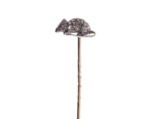 Antique diamond novelty stick pin in the form of a mouse with ruby cabochon eye and pavé set rose cut diamond body in silver 