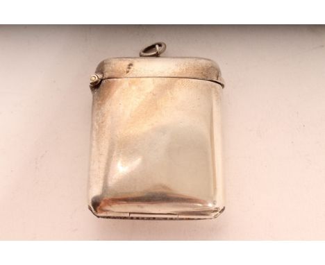 Early George V silver vesta of plain rectangular form, with hinged cover and suspension ring (Birmingham 1911), maker's mark 