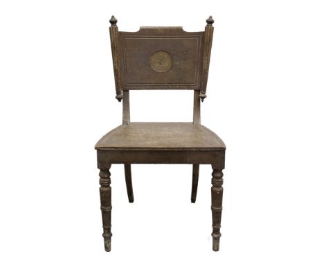 Rare George III painted hall chair, the tablet back with circular armorial cartouche and shaped seat on ring turned legs 