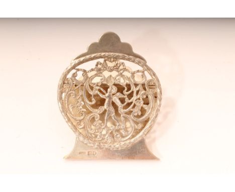 Edwardian silver paper / letter clip with pierced front panel depicting an angel picking fruit surrounded by flowers and scro
