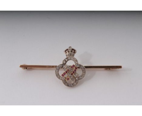 HM Queen Alexandra – fine gold, diamond, ruby and enamel presentation bar brooch with crowned ruby set A monogram within diam