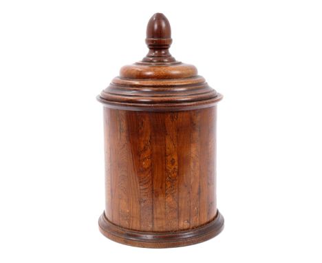 Late 18th / early 19th century oak tea caddy, of cylindrical form with acorn knop stepped cover, vertical striped inlaid base