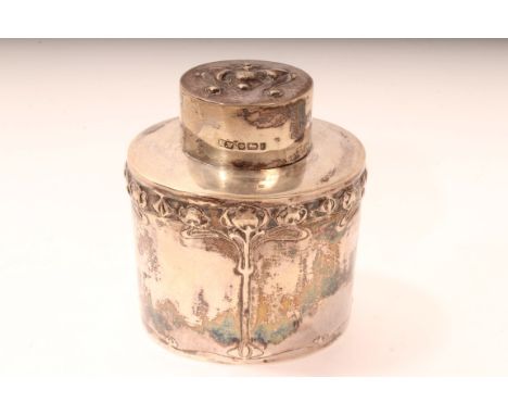 Early Edwardian Silver caddy of oval cylindrical form with floral decoration in the Art Nouveau style and slip on cover. (She