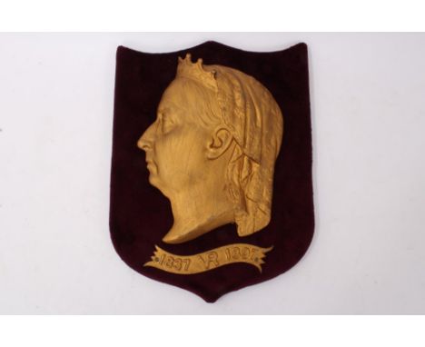 Victorian Diamond Jubilee 1897 gilt metal relief plaque by Kenrick &amp; Son, with profile portrait of The Queen and scroll ‘