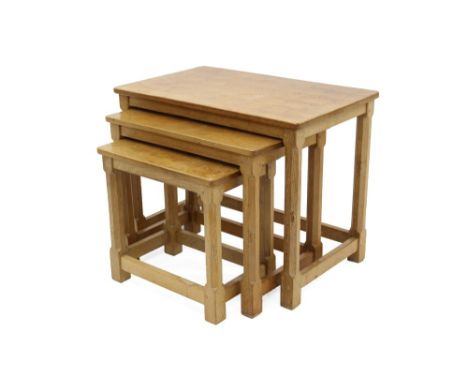 Nest of three Robert ‘Mouseman’ Thompson oak tables, each with rectangular adzed top on canted supports each carved with sign