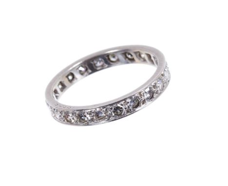 Diamond eternity ring with a full band of twenty-two single cut diamonds in platinum setting. Finger size P. Very good condit