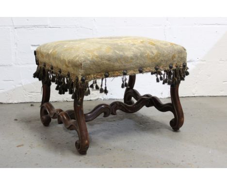 Early 18th century-style oak stool with needlework seat depicting a dragon, on carved scroll supports joined by scroll stretc