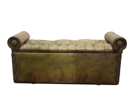 Antique close-stud leather upholstered hall seat, button upholstered hinged seat with overscroll ends and brass boss ornament