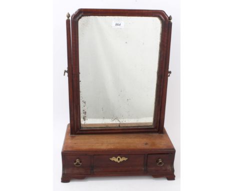 George II mahogany swing frame toilet mirror, the rectangular plate with re-entrant angles, three short drawers on squat brac