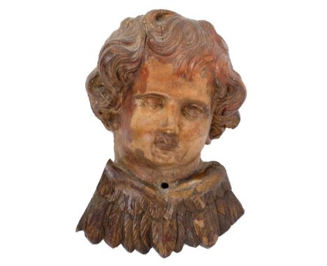 Early carved lime wood bracket, in the form of an angel’s head, traces of gilt paint, 36cm high 