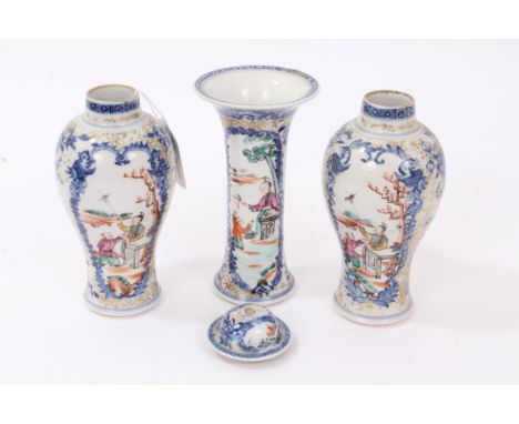 Garniture of three late 18th century Chinese export famille rose vases and one cover with figure decoration, on gilt scroll g