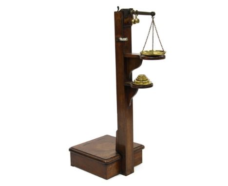 Rare set of Regency mahogany jockey scales with brass mounts, signpost form with enamel scale signed Young &amp; Son, London,