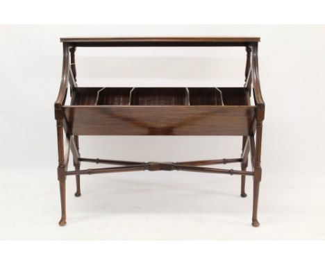 Early 20th century mahogany standing book trough with shelf and division trough raised on turned legs with pad feet, united b