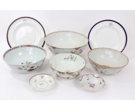 Four 18th century Chinese export porcelain punch bowls with figure and floral decoration, two saucers and seven monogrammed p