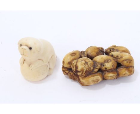 Meiji period Japanese ivory netsuke in the form of a puppy, 3cm high, together with another netsuke in the form of a mushroom