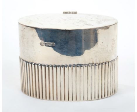 Edwardian silver tea caddy of oval form, with half-fluted decoration and hinged cover (Sheffield 1907), William Hutton &amp; 