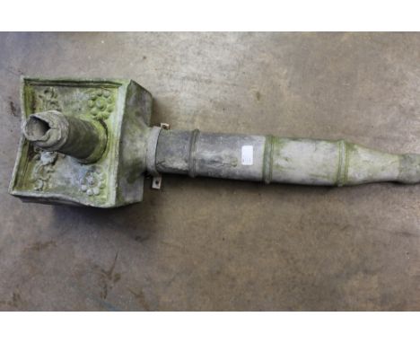 Antique lead hopper with embossed ornament, 84cm high, together with iron horse trough 