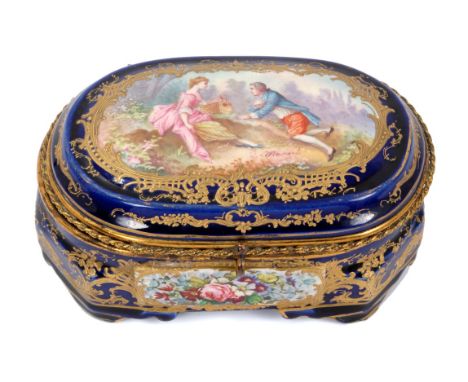 Late 19th / early 20th century Sevres style trinket box of oval form, signed C. Molnacti, the hinged cover with scene of love