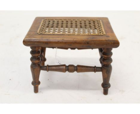 Rare 19th century yew wood child’s stool with caned seat on ring-turned supports, 22cm wide 