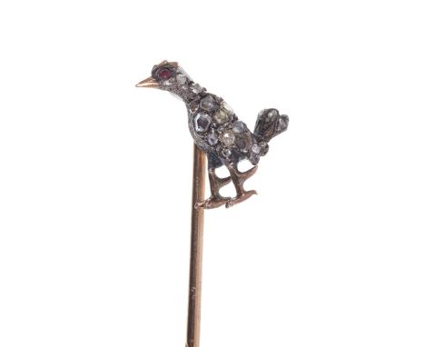 Antique diamond novelty stick pin in the form of a cockerel, with red stone eye and pavé set rose cut diamonds in silver sett