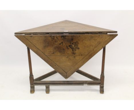 William &amp; Mary oak drop-leaf corner table, crossbanded top raised on ring-turned supports and Braganza feet, 105cm wide x