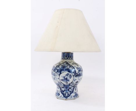 18th century Dutch Delft vase converted to a lamp, of squat baluster form, blue and white decorated with landscape and floral