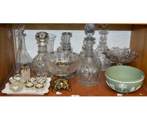 ~ Glassware including decanters, pedestal bowls, salts, together with a Wedgwood green jasperware bowl etc (one shelf)  