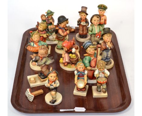 A Goebel Hummer 1960's/70's figure Girl with chicks, wearing red polka-dot headscarf, impressed marks to base 5770; together 