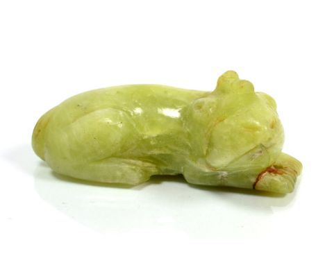 A jade netsuke of a mythical creature 