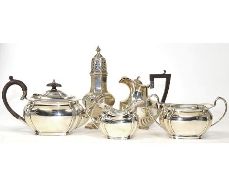 ~ A silver three piece tea service, a silver caster and a hot milk jug29ozt gross weight