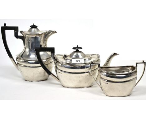 An Edwardian silver three piece tea service, Boardman, Glossop & Co, Sheffield 1906, the hot water jug 19.5cm high, 51.5ozt