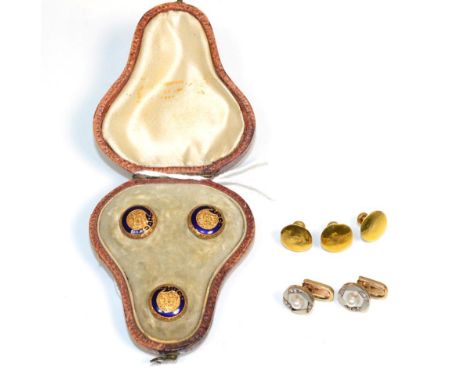 A cased set of three dress studs, with blue enamel buckle decoration and foliate engraving; a pair of Art Deco mother-of-pear