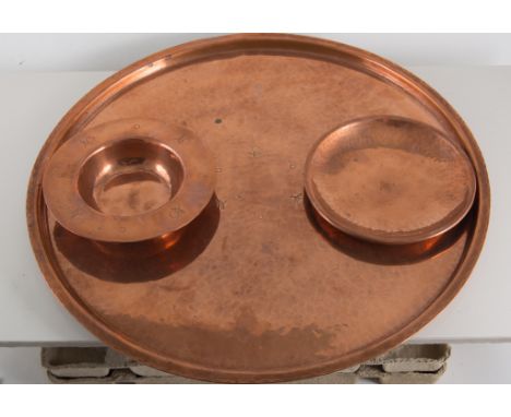 Arts and Crafts copper tray and two small dishes, plain polished design with a light hammered finish and small engraved apple