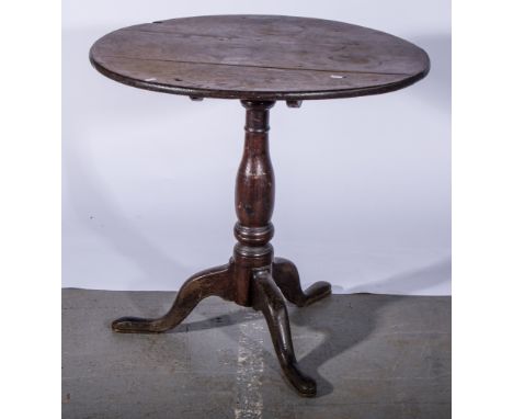 Georgian oak circular tilt top table, turned column on a tripod support, 75cm x 70cm.