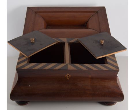 Walnut bombe shaped tea caddy, satinwood and rosewood interior, raised on bun feet,  31cm wide