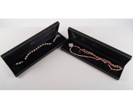 Two row coral bracelet, 6mm beads, fitted with a 9 carat yellow gold circular snap, a matching coral and freshwater pearl nec