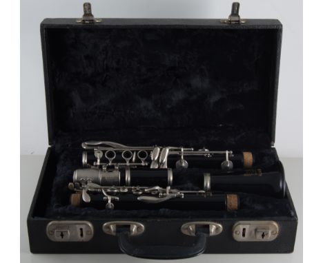 Clarinet, Boosey & Hawkes, cased with music stand.