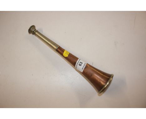 An Army & Navy copper horn dated 1900
