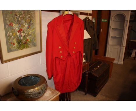 A hunting pink tail coat