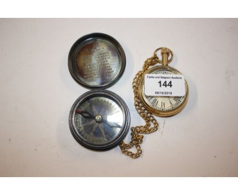 A brass cased compass and pocket watch 